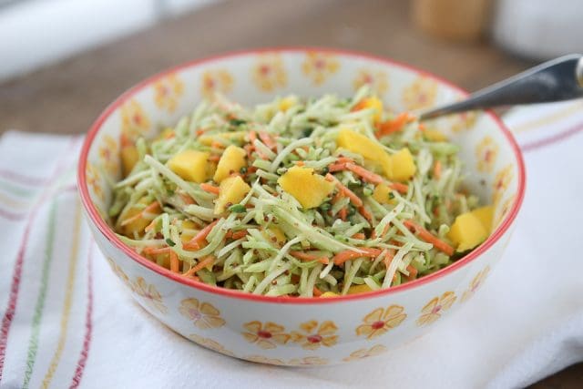 This Tangy Mustard Broccoli Slaw Salad with Mango is the perfect addition to any spring or summer meal! Serve with burgers, chicken or fish. Recipe via aggieskitchen.com