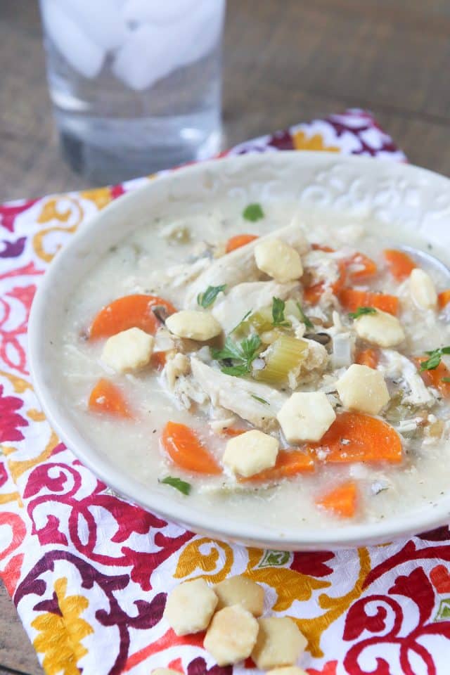 This Slow Cooker Creamy Chicken and Wild Rice Soup is the perfect addition to your school week. Made with milk, chicken, vegetables and whole grains it's a hearty and nutritious meal your family will love! #ad #UndeniablyDairy @DairyGood