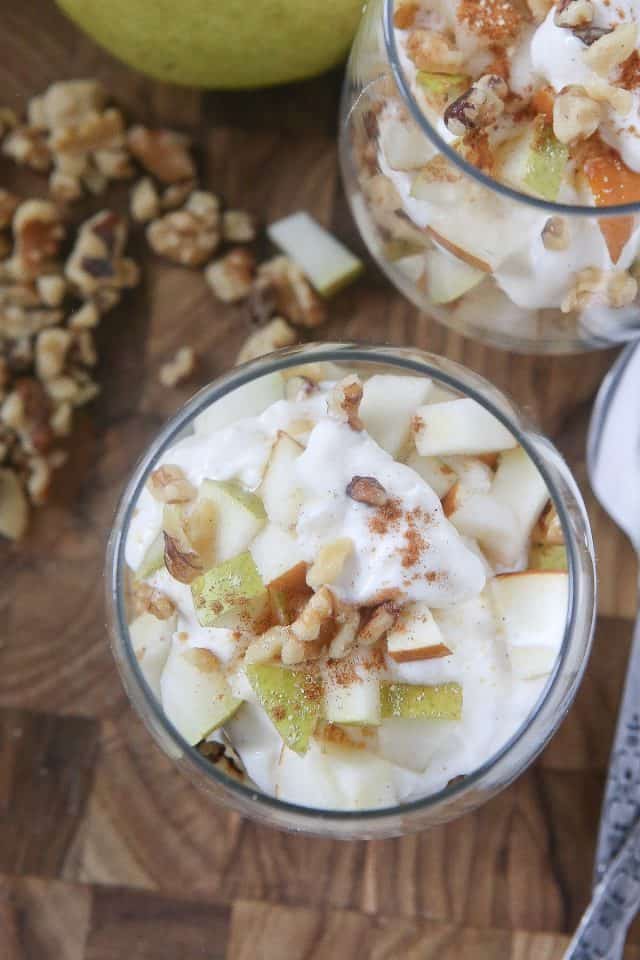 Enjoy the flavors of fall with a Greek Yogurt Parfait with Pears and Walnuts. Layers of creamy Greek yogurt, spiced pears and crunchy walnuts in every bite! Great snack or dessert idea using Greek yogurt. #ad #UndeniablyDairy @DairyGood