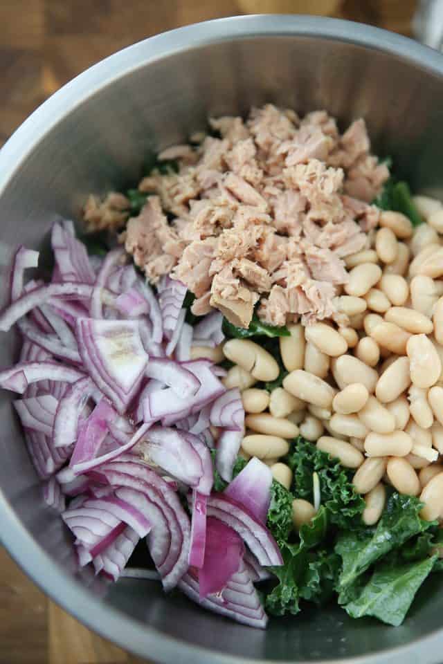 Packed with protein and nutrients your body will thank you for, this Lemony Tuna and White Bean Kale Salad with Avocado is one of my favorite salads. #tuna #kale #salad #avocado #LowCarb