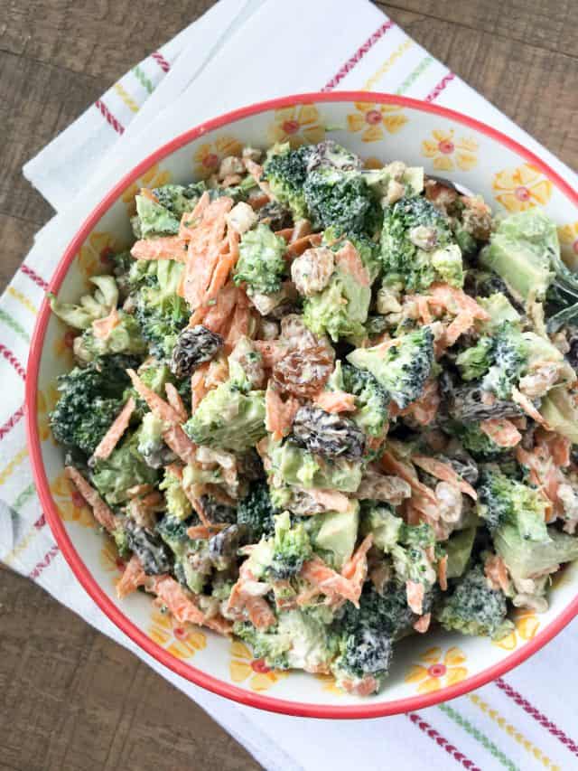 Need a side dish for summer entertaining? I've got you covered with this simple Broccoli and Raisin Salad with Walnuts. #ThinkFisher #broccoli #salad #carrots #salad #walnuts #picnic