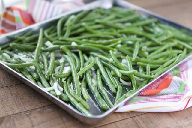 sheet pan of green beans before cooking